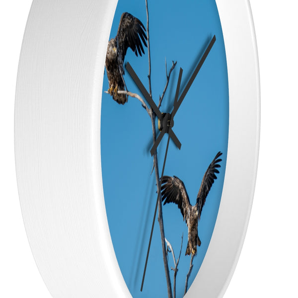 Wall clock with a pair of juvenile bald eagles